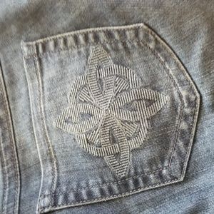 CAbi boot cut Jean pocket design